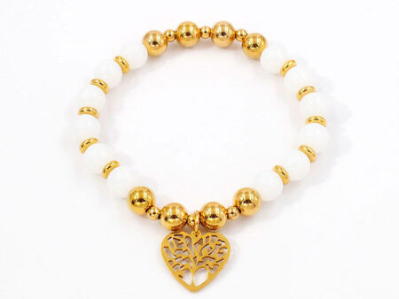 Pulsera elástica bolitas blancas dorado