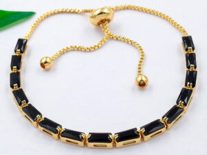 Pulsera dorada ajustable c/pedrería negra