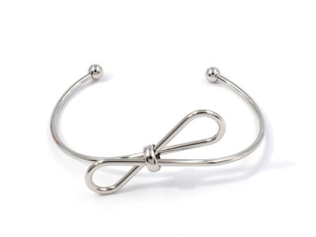 Brazalete plateado abierto moña al frente
