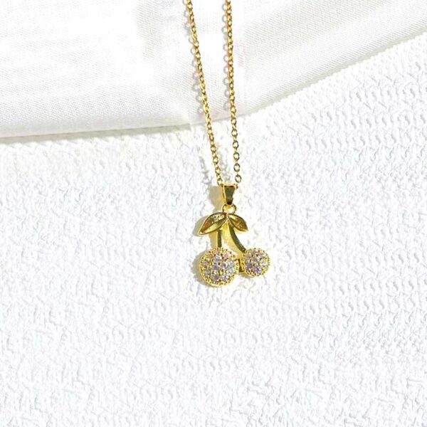 Collar ddorado dije cerecitas con pedrería
