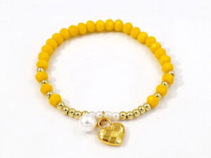 Pulsera elástica cristales amarillos dije corazón dorado