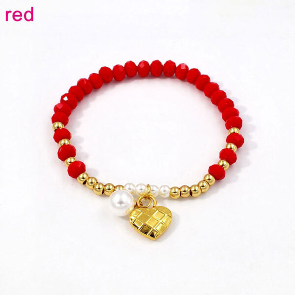 Pulsera elástica cristales rojos dije corazón dorado