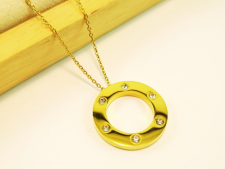 Collar dorado 45cm dije circular 2.5cm pedrería