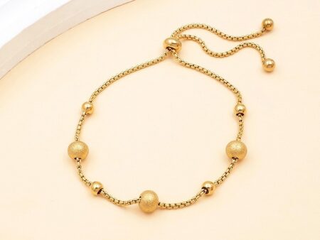 Pulsera dorada ajustable bolitas escarchadas
