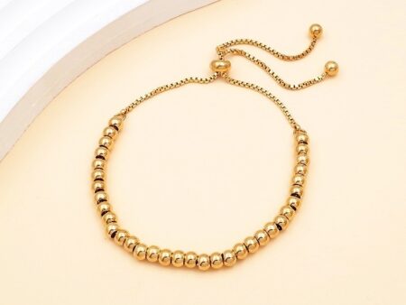 Pulsera dorada cuentas 4mm ajustable
