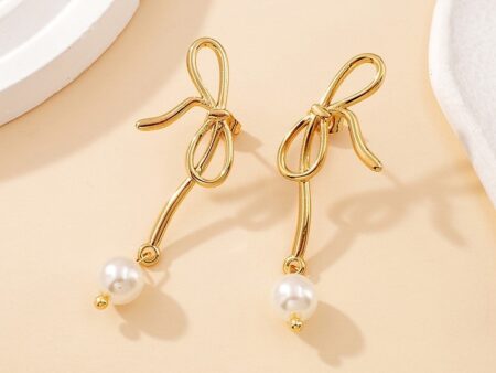 Aretes dorados 5cm moñita y perla