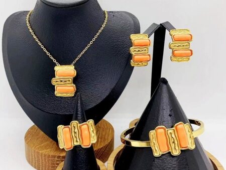 Set dorado 4 piezas con naranja