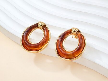 Aretes dorados 2.8cm aro acrílico ocre