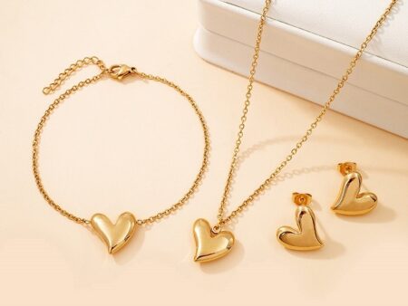 Set dorado 3 piezas dijes corazones