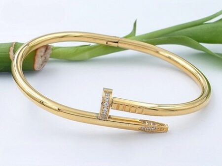 Brazalete dorado "JUClue" 6cm pedrería