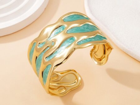Brazalete dorado abierto grueso c/celeste