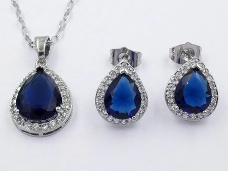 Set plateado dije y aretes gota azul pedrería