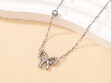 Collar plateado 45cm moñita