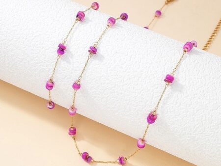 Set dorado piedras fucsia