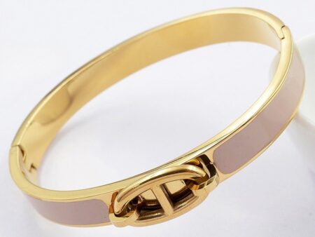 Brazalete dorado y nude diseño H_Rmés