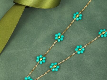 Collar dorado 40cm florecitas cristales turquesa
