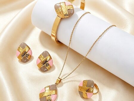 Set dorado 4 piezas rosa y beige talla 7