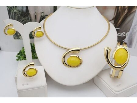 Set dorado 4 piezas piedra amarilla