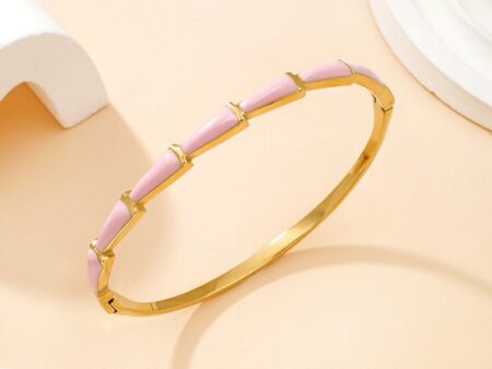Brazalete dorado 6cm diseño al frente rosado