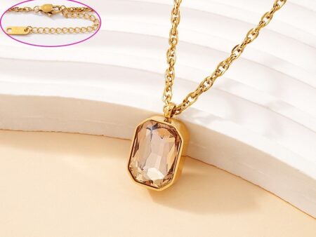 Collar dorado dije piedra tono miel 2cm