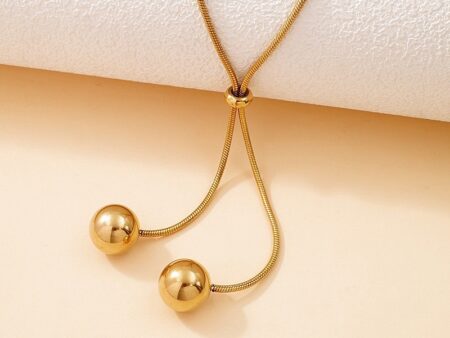 Corbatero dorado 70cm bolitas en puntas