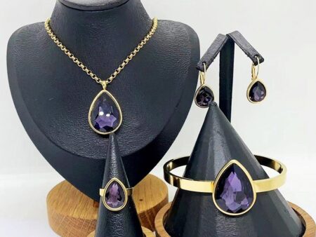 Set dorado 4 piezas piedra morada