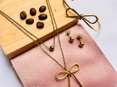 Set dorado Collar y Brazalete Moña