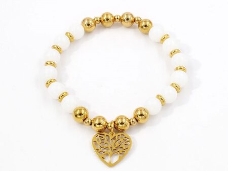 Pulsera dorada y piedras blancas