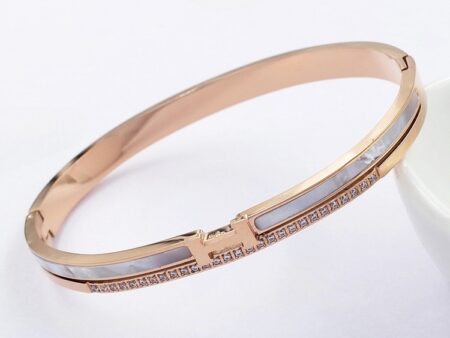 Brazalete rose gold nácar y pedrería "H_ErMés"