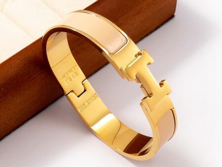 Brazalete dorado 58*14mm beige diseño H