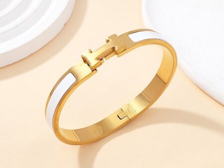 Brazalete dorado 58*8mm c/blanco diseño H