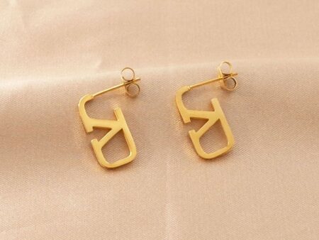 Aretes dorados diseño VaLenTino"