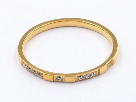 Anillo dorado 1mm circonias intercaladas