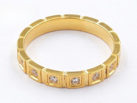 Anillo dorado cuadriculado pedrería