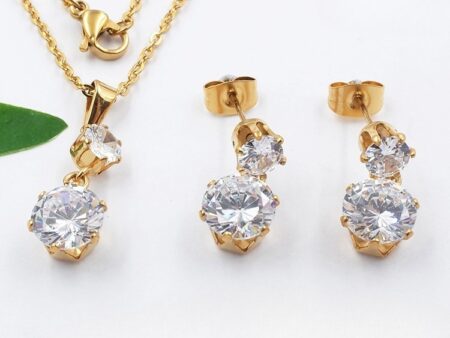Set dorado dije y aretes doble pedrería