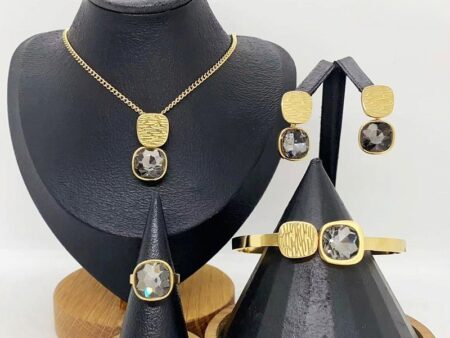Set dorado 4 piezas piedra gris