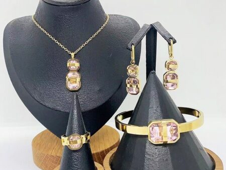 Set dorado 4 piezas piedra rosa