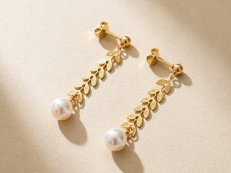 Set dorado Pulsera y aretes eslabón hojitas