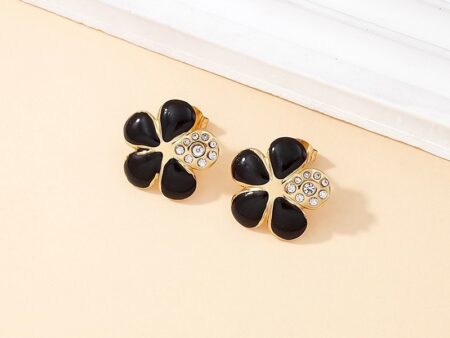 Aretes flor pétalos negros y pedrería